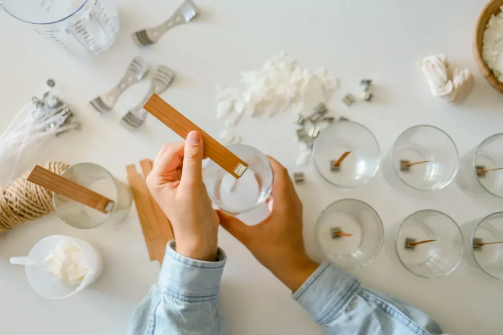 A picture of some hand poured candles you could make if you wanted a personalized touch to the party favors.