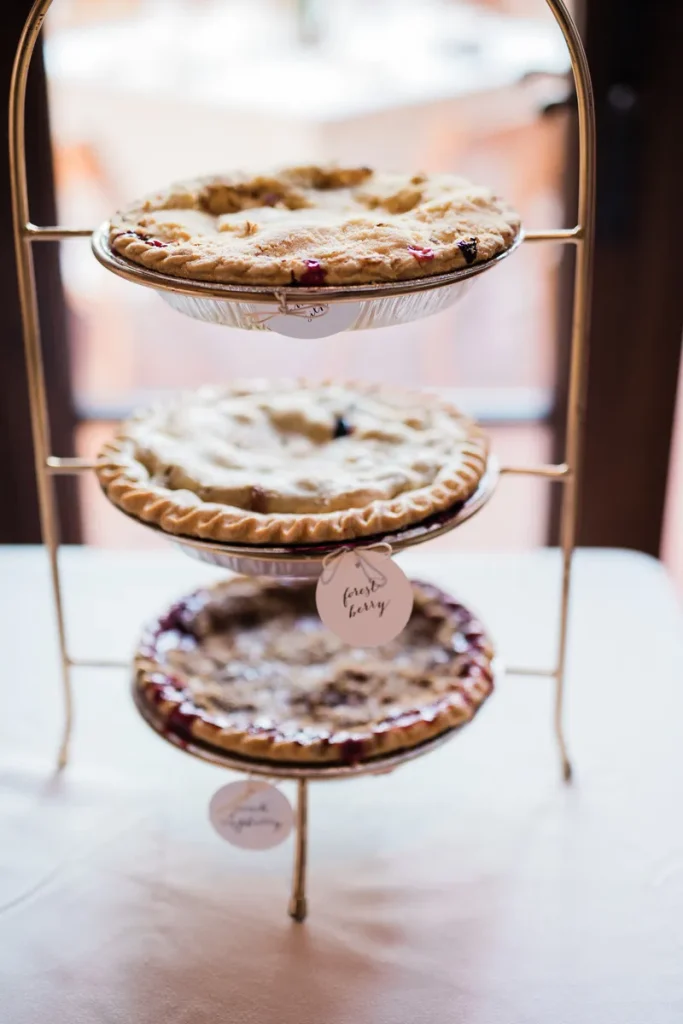 A display of three different kinds of pies, something you can easily do instead of cake at your wedding.