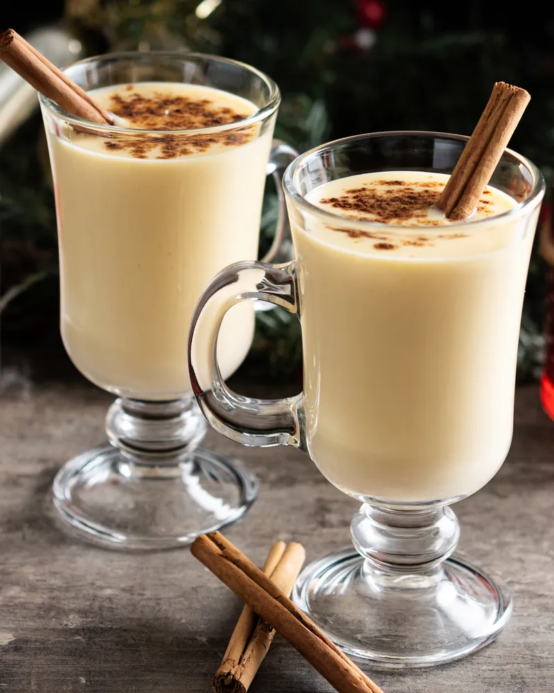 Some eggnog with cinnamon on top.