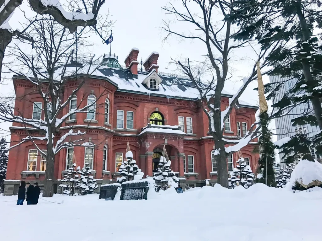 A gorgeous historic inn covered in snow.