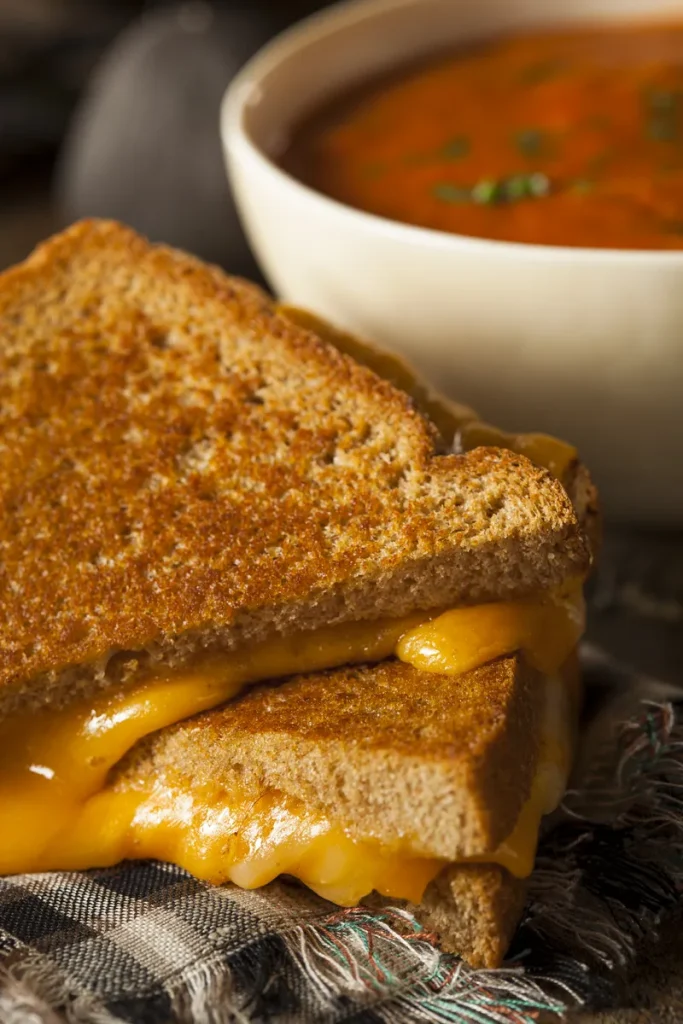 Grilled cheese with a side of tomato soup.