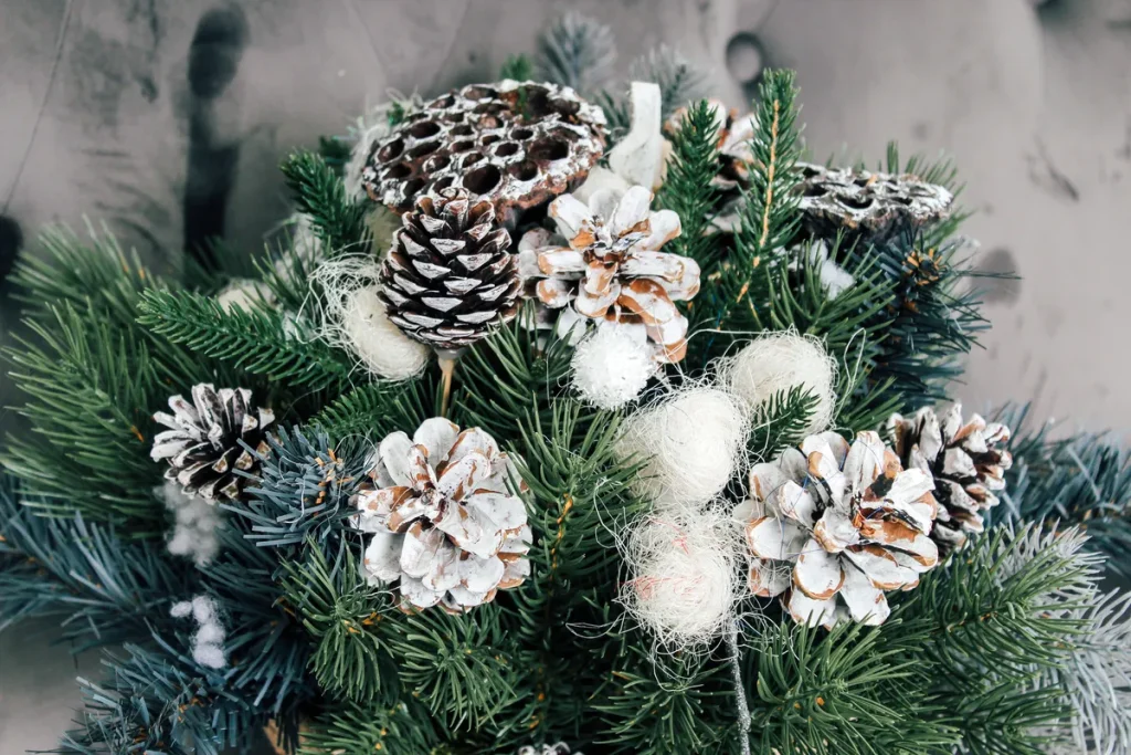 A bouquet of pinecones and evergreens.
