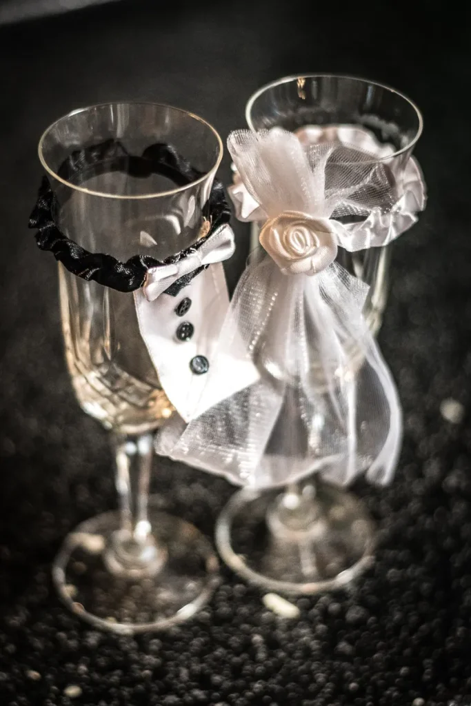 A his and hers set of wine flutes.